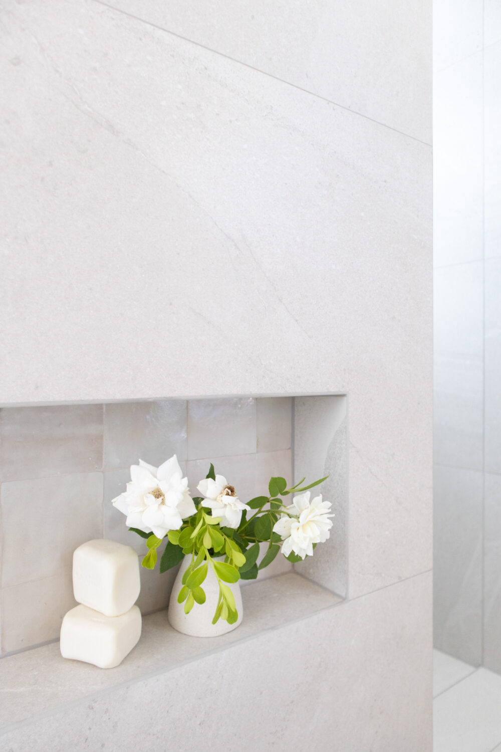 WALL TILES: Nordic Stone Islanda Satin Honed: 600x1200mm
FEATURE TILES: Zellige Lily