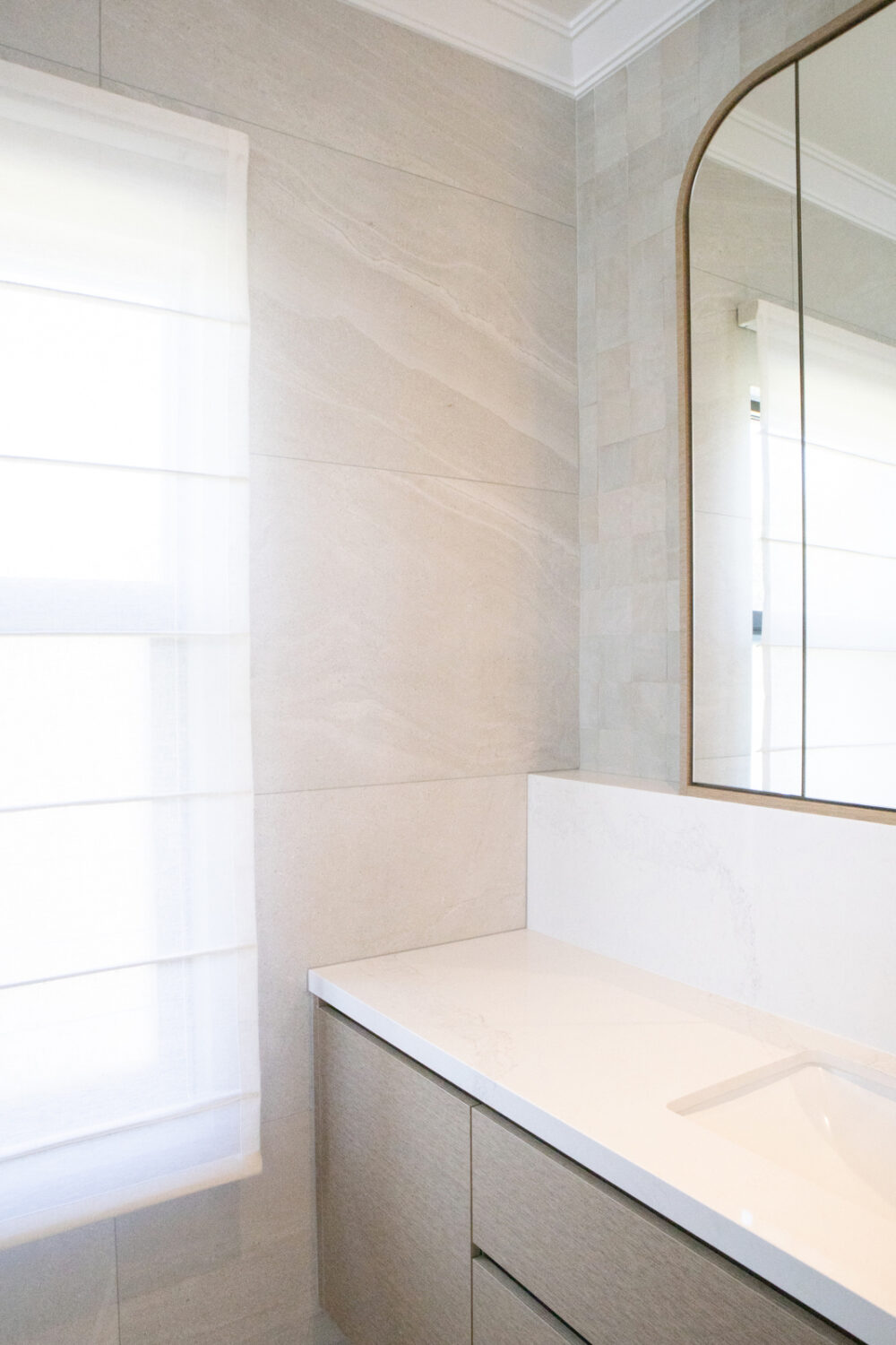 WALL TILES: Nordic Stone Islanda Satin Honed: 600x1200mm
FEATURE TILES: Zellige Lily
