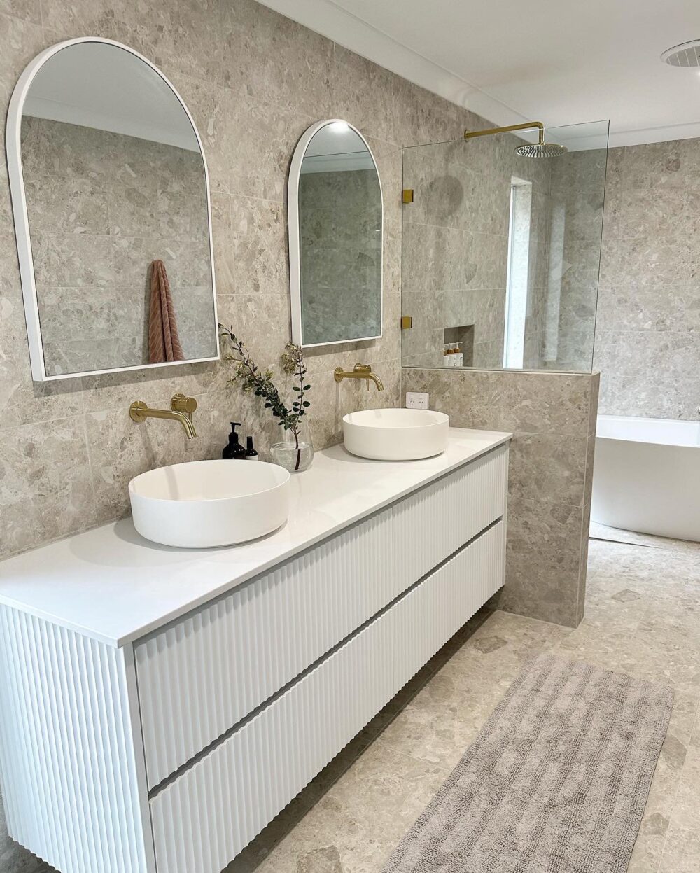 Robusta Light Grey by Griffiths is featured throughout this bathroom